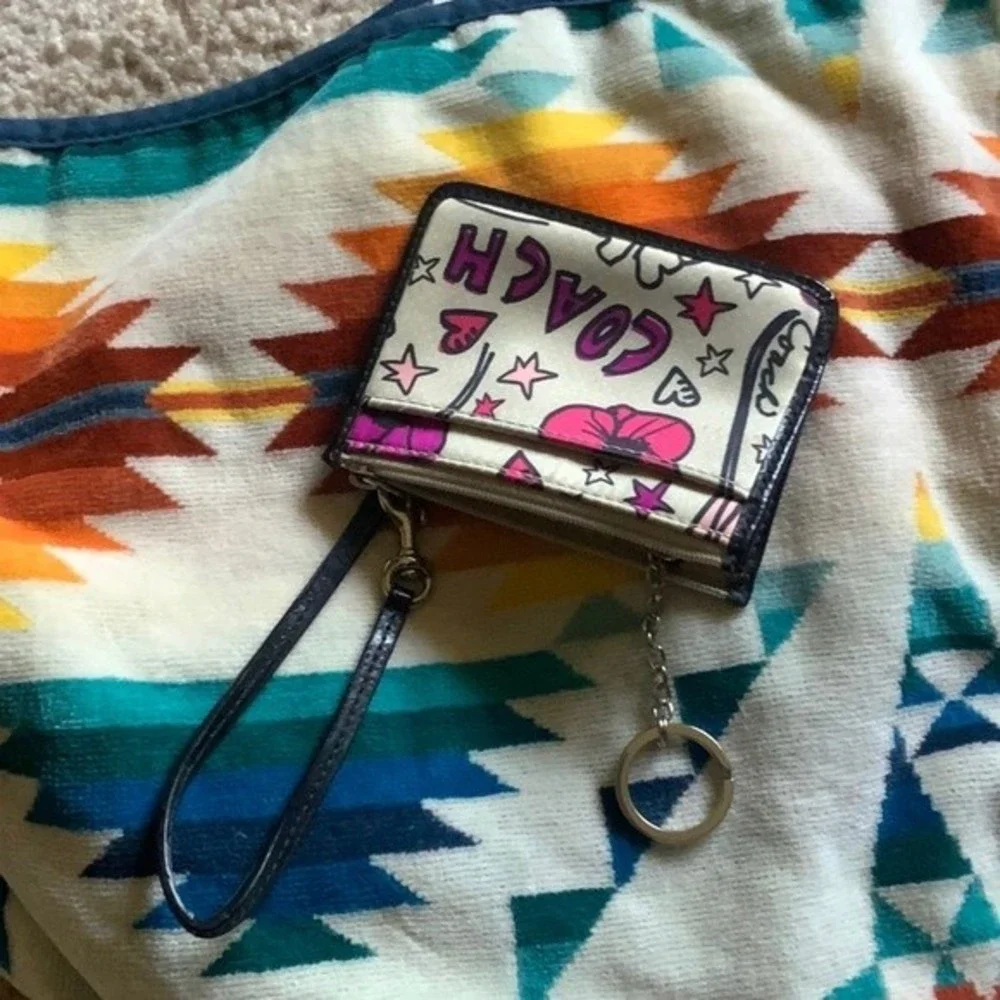 Coach Wristlet Multi-Color, Excellent Used Condition Measurements; 4.5’ X 3.5’.